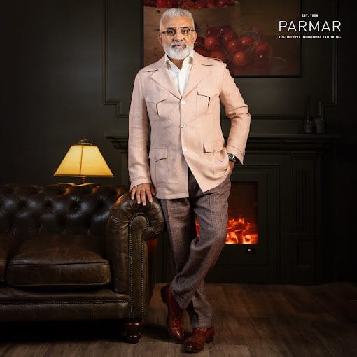 Parmar blog image man standing in suit