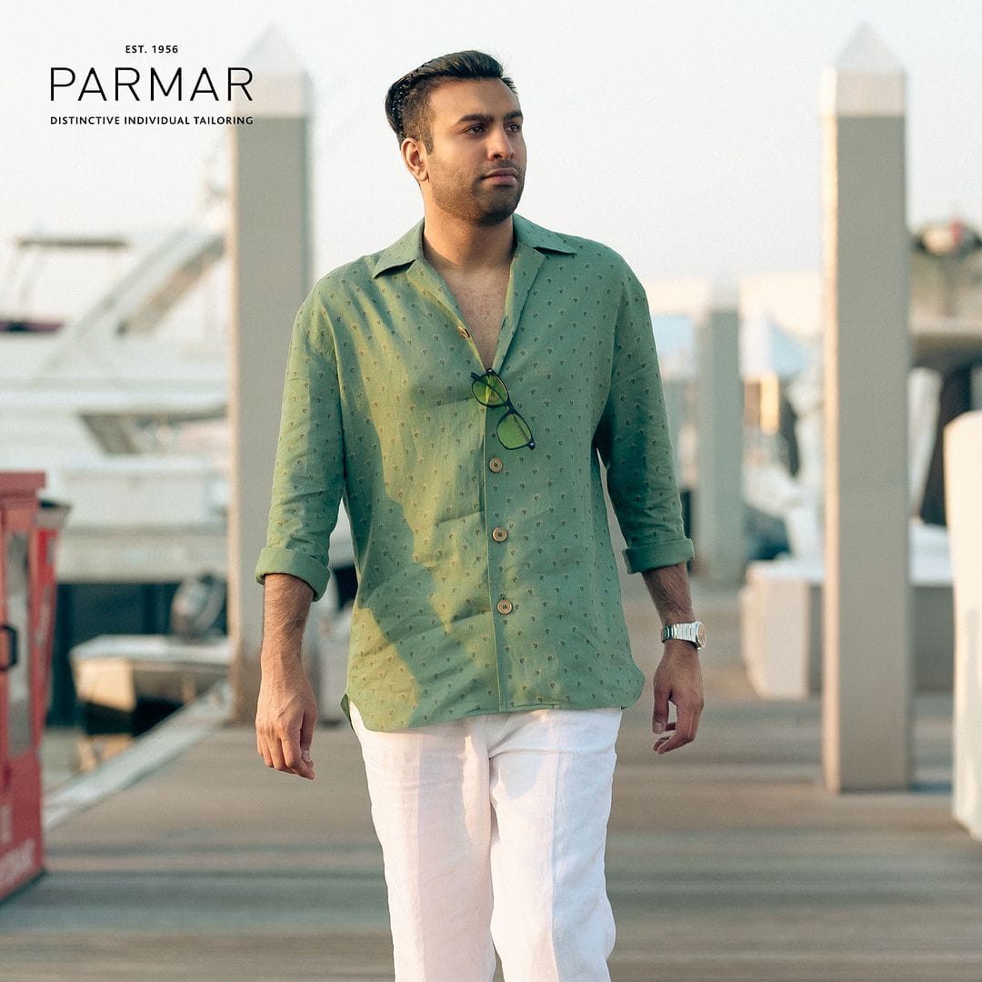 Parmar Tailors Man in Green Image